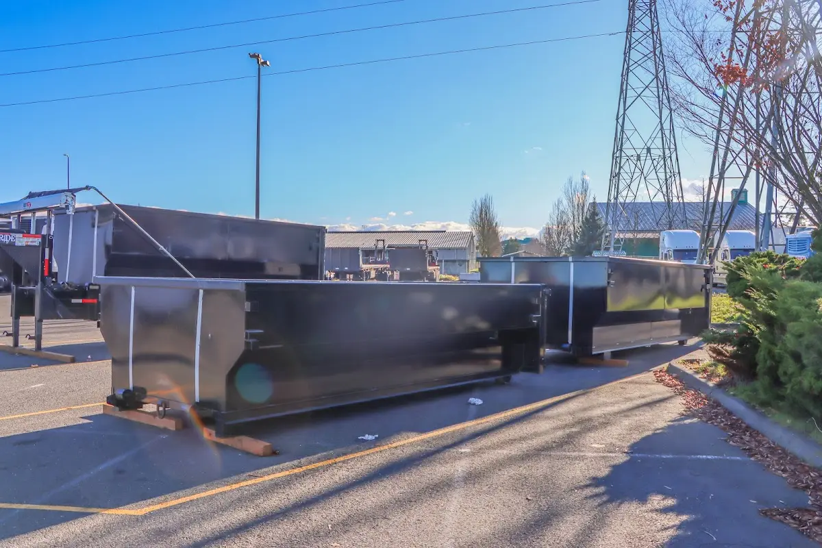 Roll-off dumpster ready for waste disposal at job site for Construction Dumpster Rental in Coweta
